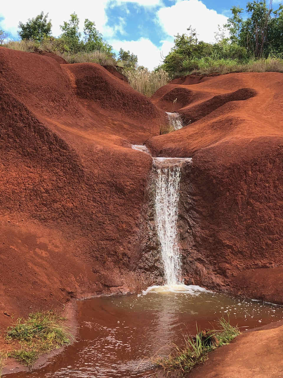 Red dirt waterfall Waimea Canyon Kauai